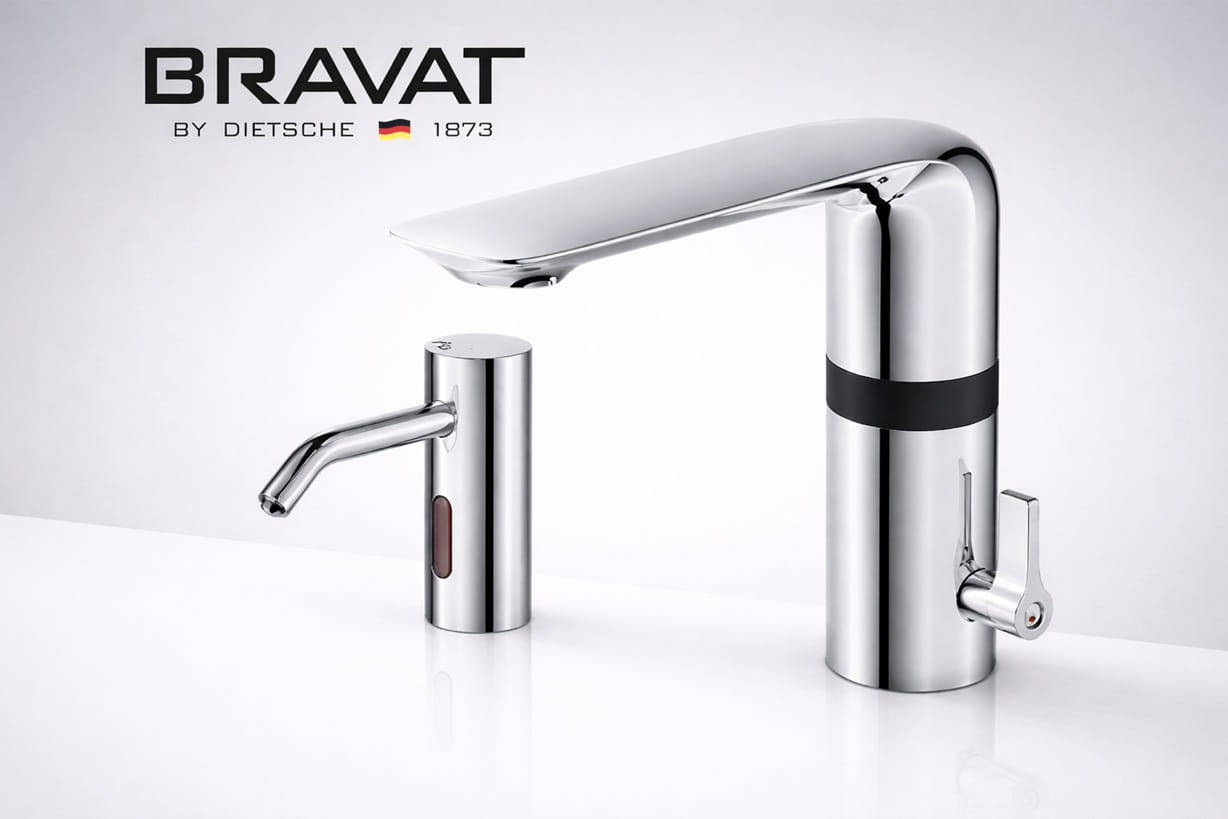 Commercial office restroom with automatic touchless faucets and modern sensor-based sink design